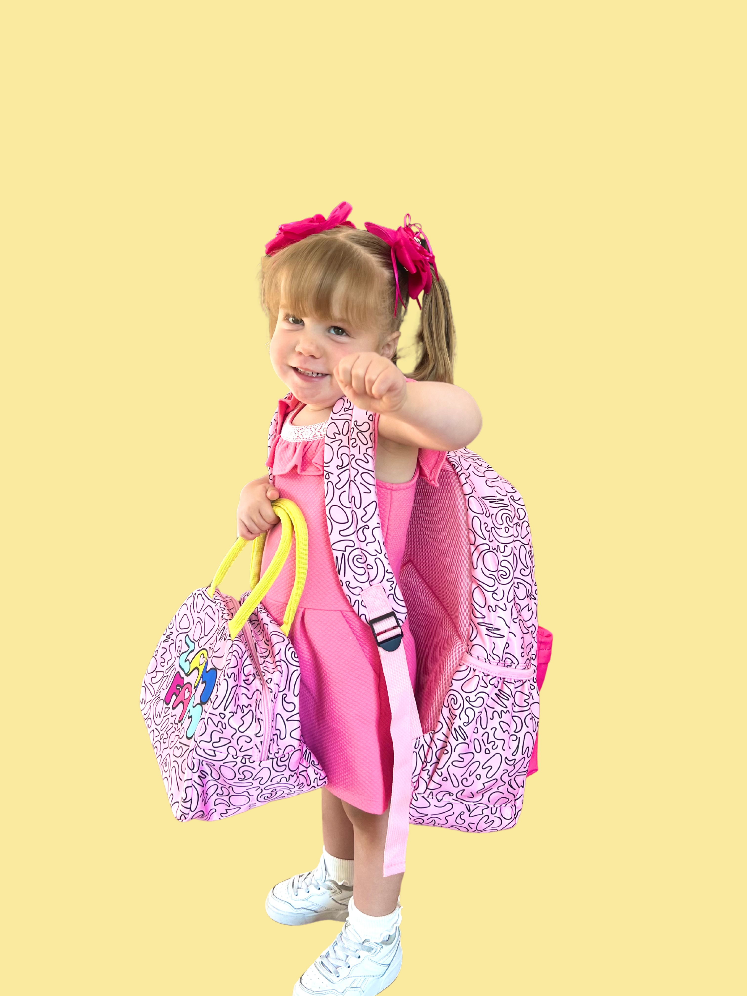 Zadie Zamolo wearing the back to school backpack and lunch bag.