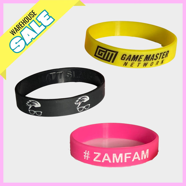 3 bracelets featuring Game Master Network, Matt Slays Hair & Glasses, and #Zamfam brands with a Warehouse Sale tag