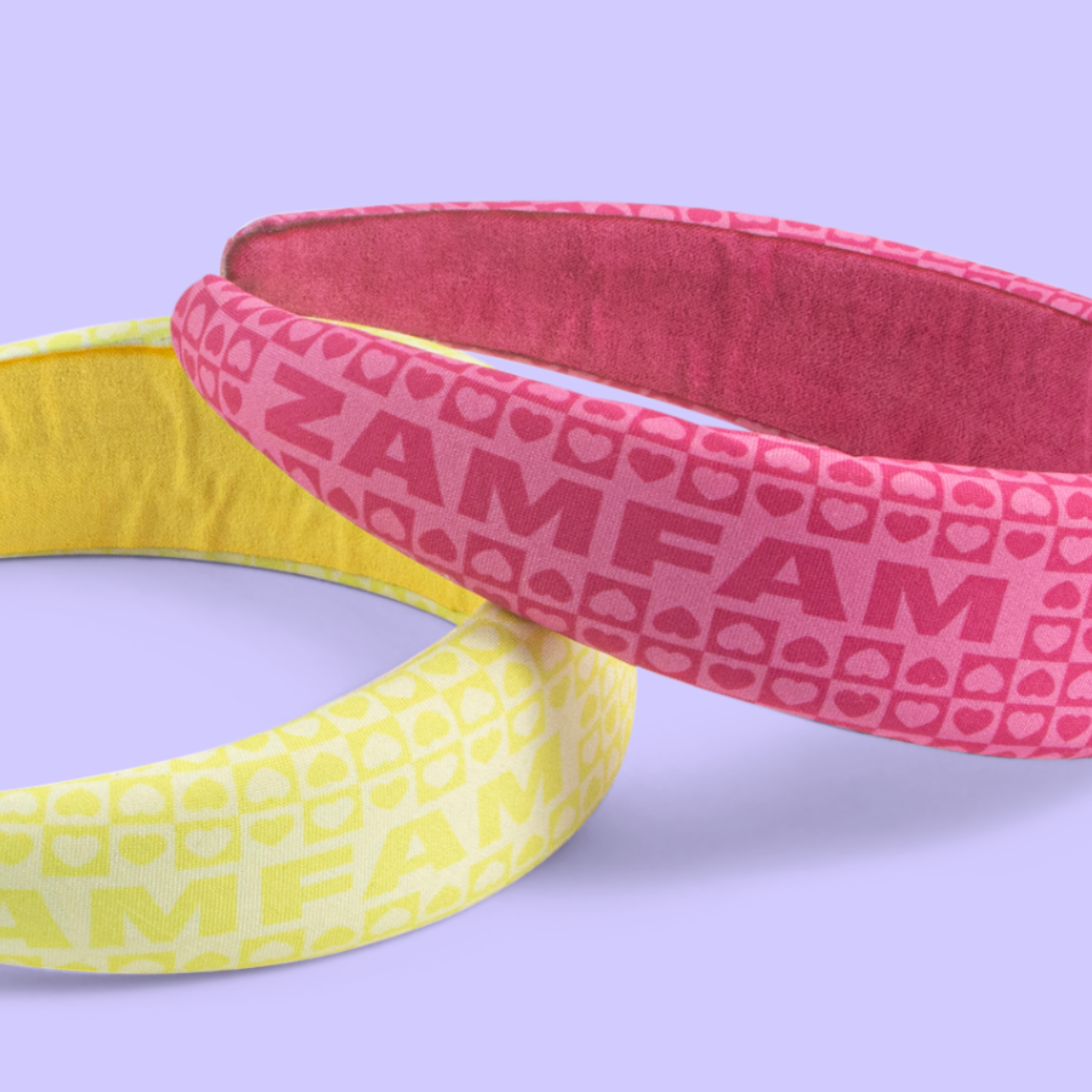 Closeup of yellow and pink headbands.