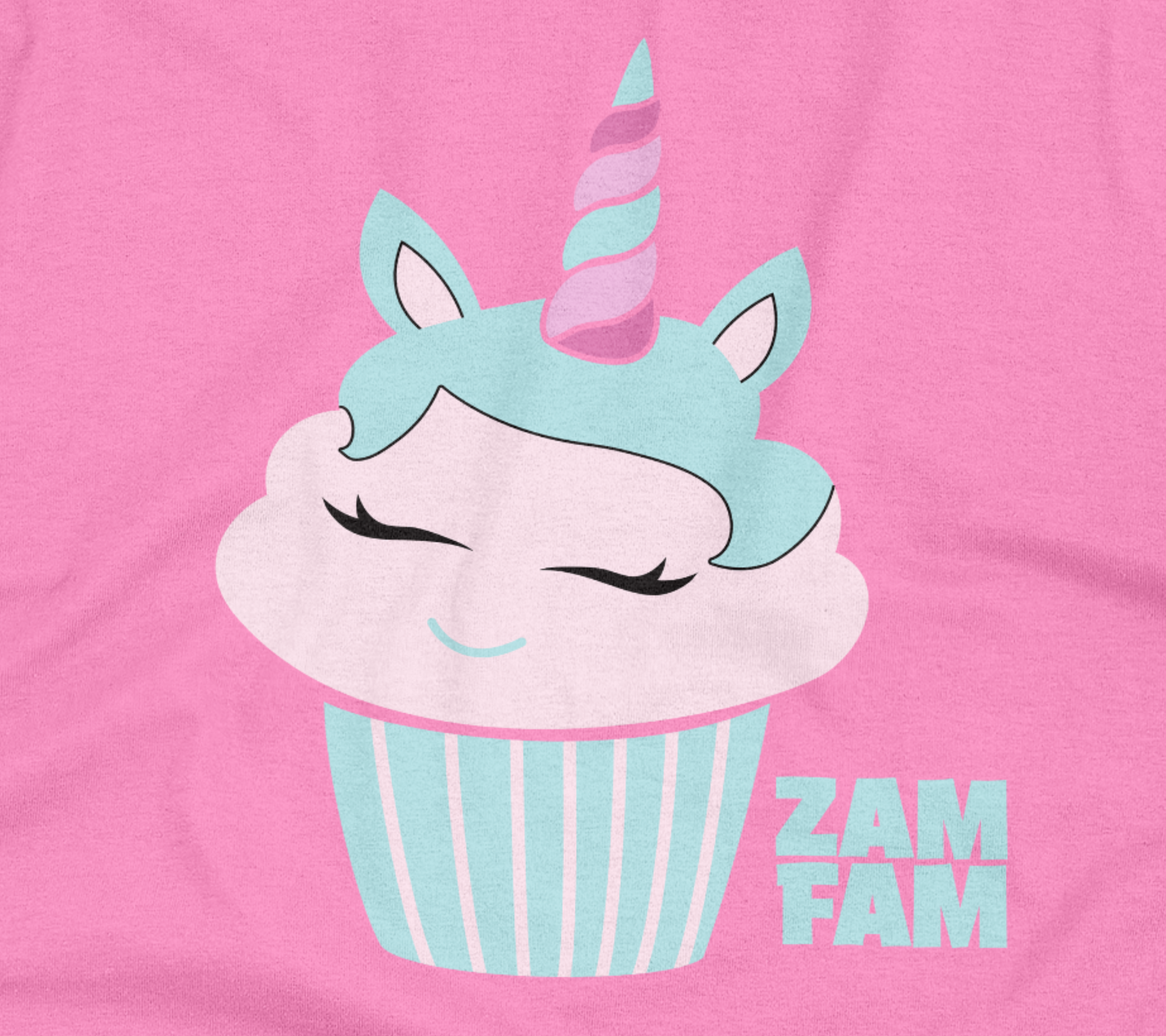 Close up of the pink tee featuring a cupcake unicorn design.