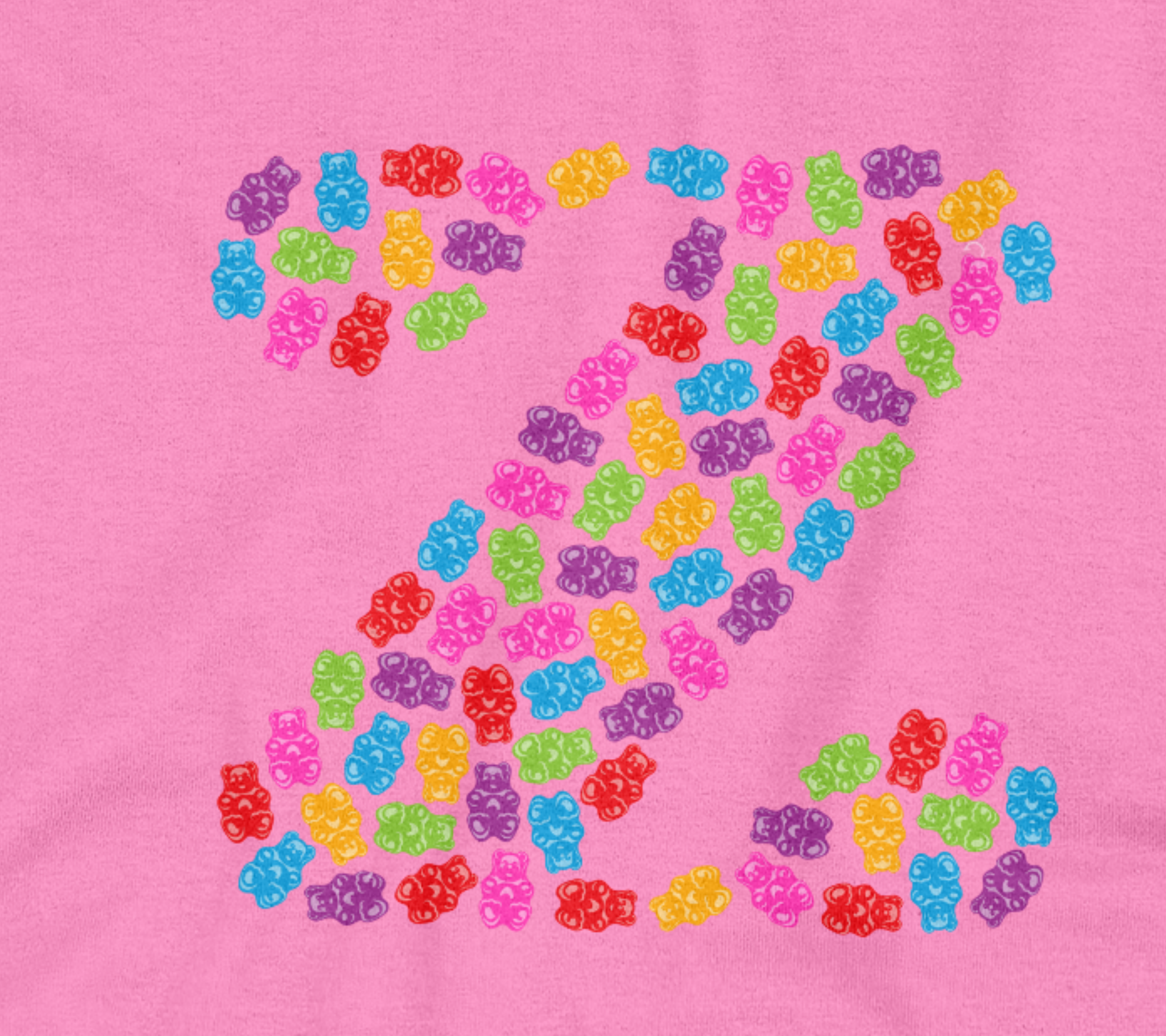 Close up of the pink tee with gummy bear designs.