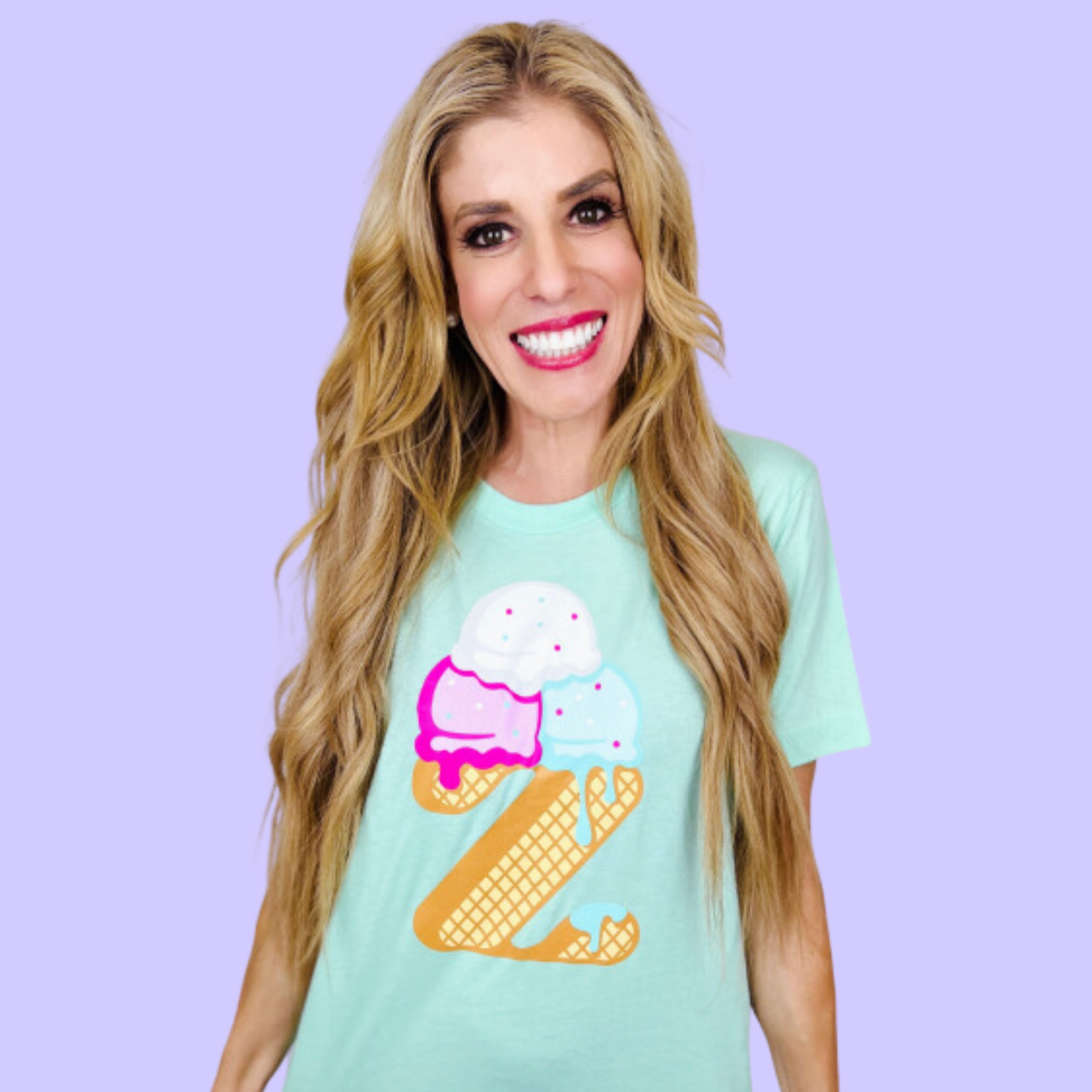 Rebecca Zamolo wearing the teal tee with an ice cream design.