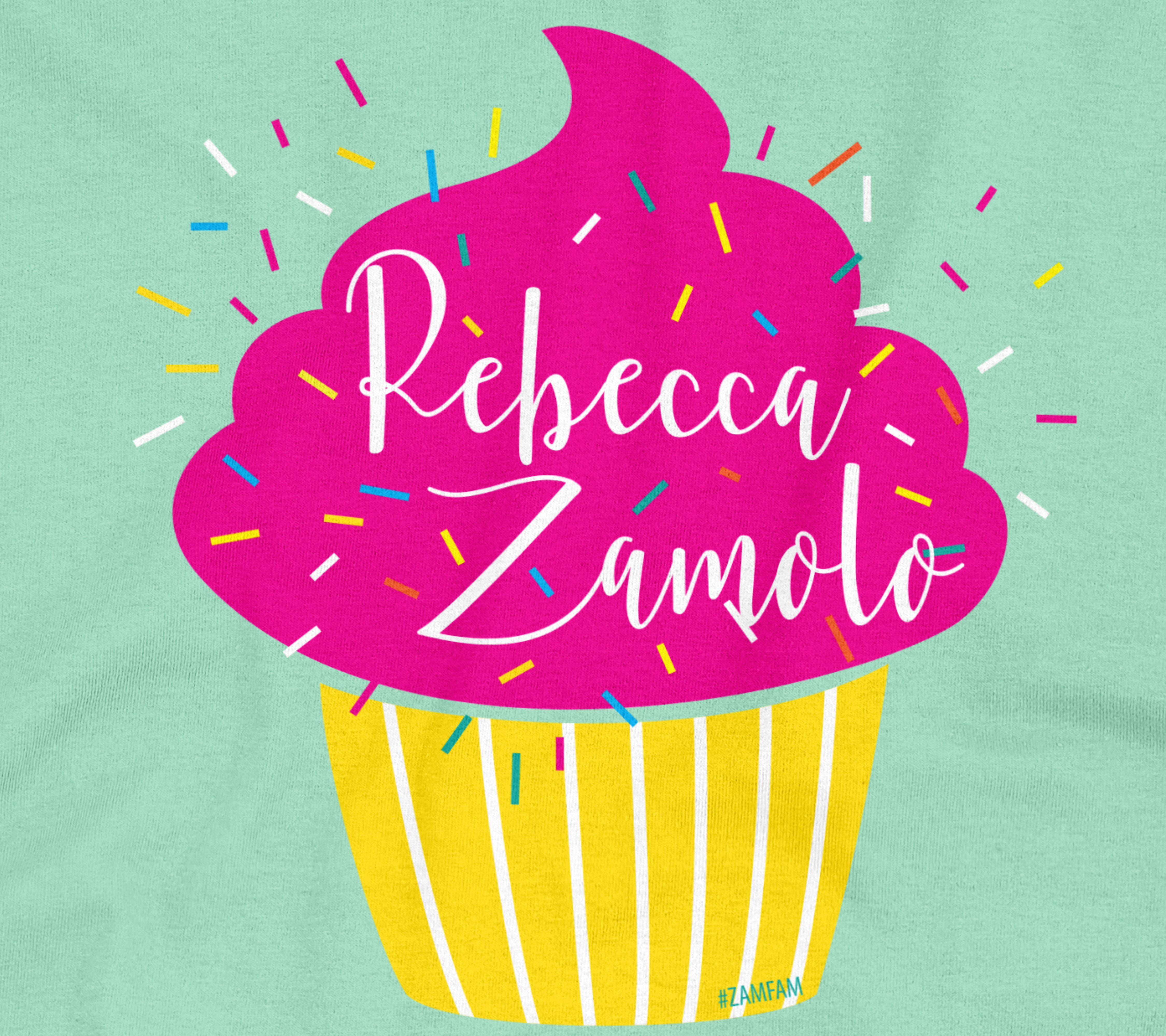 Close up of the cupcake tee in teal featuring a cupcake design and confetti.